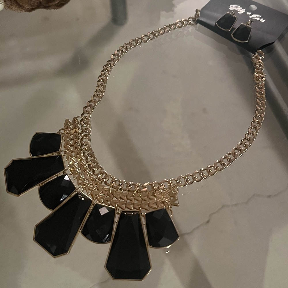 Gold and black statement necklace and earring set